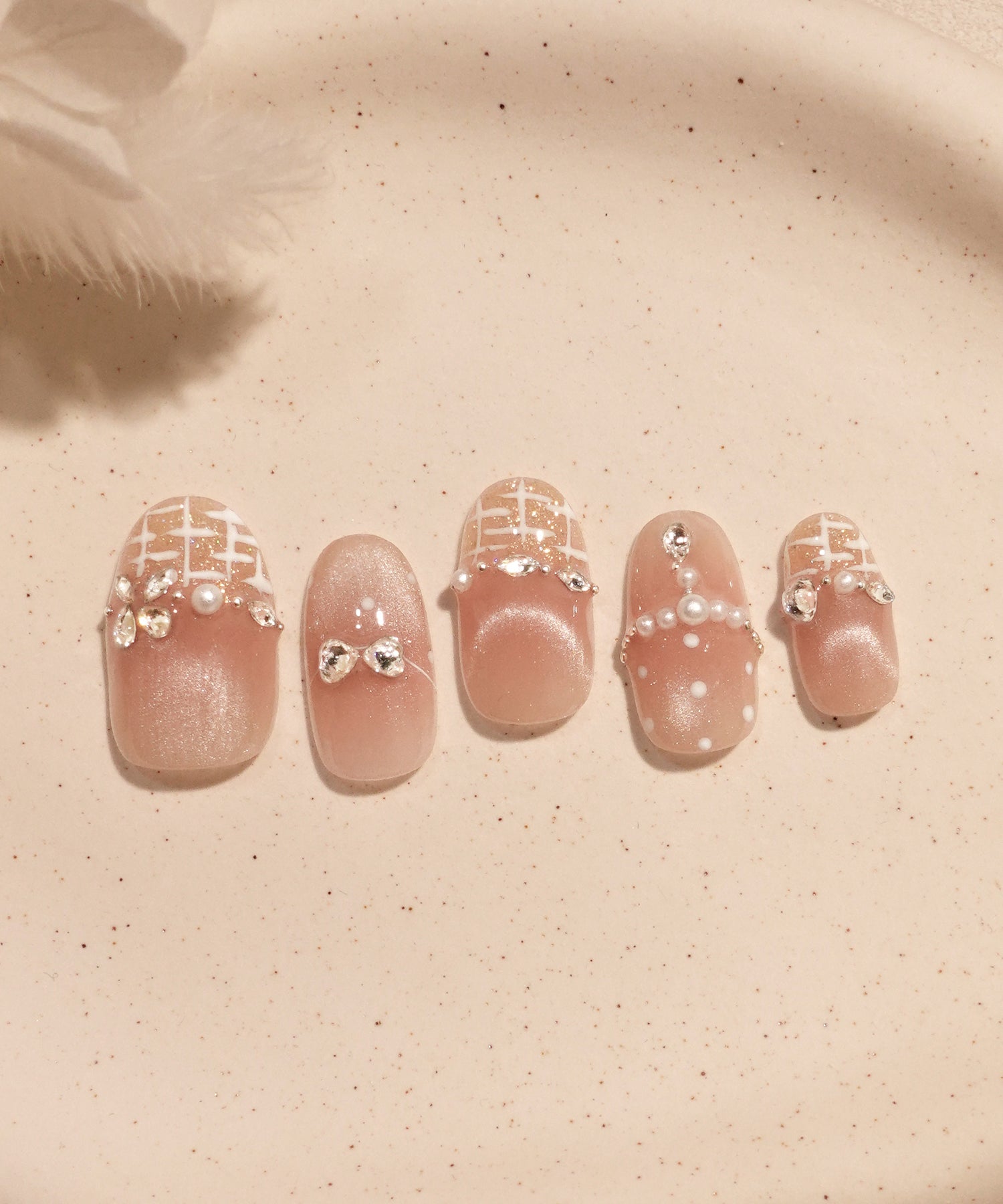 水光ネイルローズピンクツイードフレンチパールストーンドットオーバル