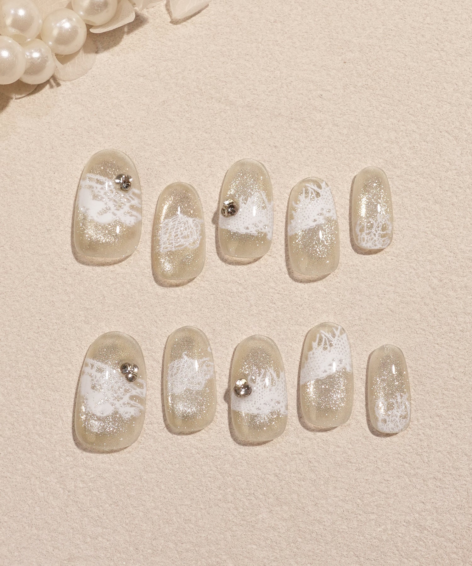 【当日発送】水光ネイルシャンパンゴールドマグネットホワイトレースストーンオーバルネイルチップ